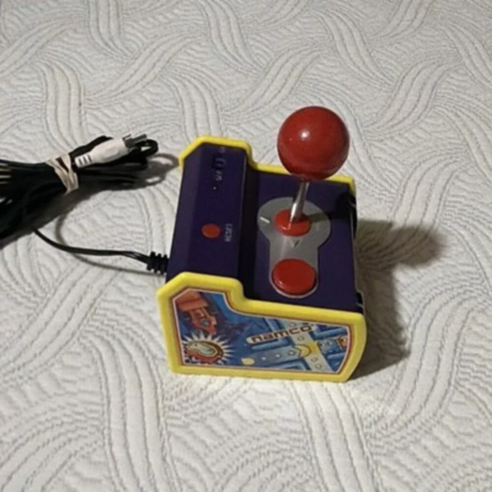 Namco Play TV Plug & Play Joystick Handheld Electronic Game Purple/Yellow